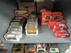 A shelf of modern diecasts, EFE 00 & 1:76 scale (19) and Corgi Royal Mail (17), 36 in total all