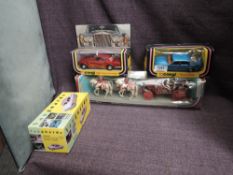 Three Corgi diecasts, 279 Rolls Royce Corniche in metallic red with beige interior, 338 Rover 3500