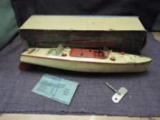A Hornby tin plate and clockwork Speed Boat, Racer III with key and in original box