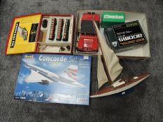 A shelf of mixed toys including Revell 1:144 plastic Concorde Set 1969-2003, TTR part Train Set,