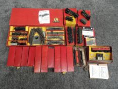 A collection of Trix Twin Railways all in original red boxes with yellow labels including Main
