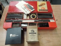 A Trix Twin Railway N0 2/315 LMS Suburban Passgr Train Set, 0-4-0 Loco with three carriages, track