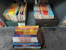 A shelf of vintage Childrens Annuals, Beano 1981, 1983, 1985, 1987-1993, 1995-2008, Dandy 1970,