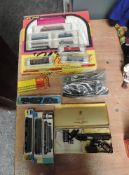 A collection of N Gauge, Life Like Mini Train Set Burlington Locomotive with four wagons and three