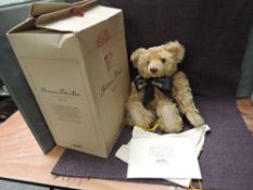 A modern Steiff Limited Edition jointed Teddy Bear, 670985 Centenary 03963, having growling