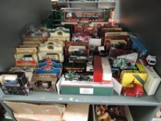 A shelf of modern diecasts including Lledo, Matchbox Models of Yesteryear, Atlas etc, most boxed