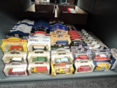A shelf of Lledo Days Gone and similar diecasts, approx 180+, all in window display boxes