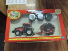 A modern Britains 1:32 scale set, 09673 Valtra Valmet 8750 Tractor & Volac 820 Bale Wrapper Gift