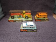 Three Dinky diecasts, 268 Range Rover Ambulance, 416 Motorway Services Ford Transit Van and 963 Road