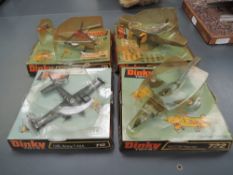 Four Dinky diecast Aircrafts, 712 US Army T42A, 721 Junkers JU 87B Stuka, 722 Hawker Harrier and 736