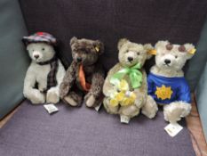 A set of four modern Steiff Seasons Teddy Bears, 654466 Spring, 654473 Summer, 654435 Autumn and