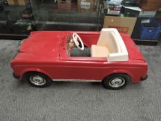 A Sharna Rolls Royce Corniche Child's Electric Car, red with cream interior, registration plate