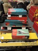 A collection of Trix Twin Railways in later blue & red, Yellow & black and green and red boxes