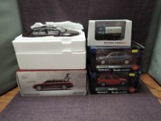 A Shanghai Volkswagen 1:18 scale diecast Skoda Superb, two Abrex 1:24 scale Skoda Fabia and Skoda