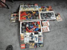 Three Lego Technic part sets, 8848, 8859 & 8860 along with two Lego part sets 7861, not checked