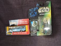 A Dinky diecast, 122 Volvo 265 Estate in original card display box along with a Kenner Star Wars The