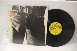 A copy of the iconic Warhol Zip sleeve Rolling Stones ' Sticky Fingers ' VG / VG+ a cautious grading