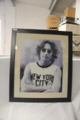 A John Lennon framed 'NYC ' classic iconic print - Beatles interest - measuring 58cm x 67cm