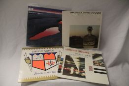 A Simple Minds lot with four of the early classics including their debut