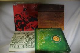 A lot of eight Slade and Alice Cooper albums in at least VG+ / VG +