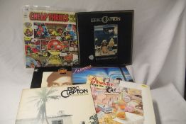A sixteen album mixed lot in general VG condition with Eric Clapton , Al Stewart , Eagles , Big