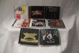 A lot of 16 compact discs - some interesting titles on offer - rock , pop and more