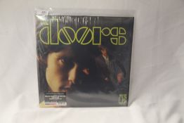 A Rhino Doors 2009 Stereo Press in EX/EX - A great sound on this issue