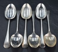 A group of six George V silver Old English pattern table spoons, with pip reverse and engraved