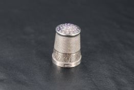 A George V silver and Derbyshire Blue John thimble, of traditional form the inset apex formed from