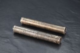 Two African white metal bars, testing as silver and weighing 348grams gross. Apparently these bars