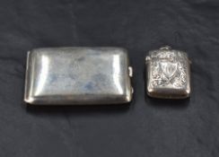 A George V silver match book case, of hinged and rounded rectangular form, marks for Birmingham