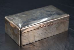 A Queen Elizabeth II silver cigarette box, of hinged rectangular form with engraved initials 'G.E'