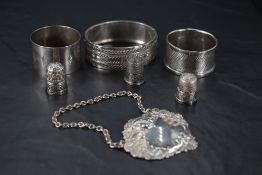 A Queen Elizabeth II silver 'Sherry' spirit/decanter label, embossed with foliate scrolls and face