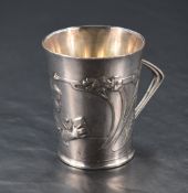 A WMF Britannia metal cup, of flared cylindrical form with Art Nouveau sinuous foliate decoration