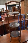 An early 20th Century stained frame folding cake stand