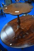 A reproduction wine table having 'flower' top