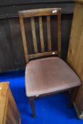 An Arts and Crafts style oak rail back dining chair