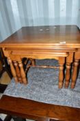 A modern yew effect nest of three tables