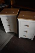A pair of modern three drawer bedside chests