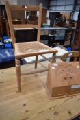 A Victorian cane seated bedroom chair and a pine stationery box