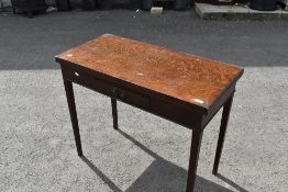A 19th Century oak fold over tea table, width approx. 91cm