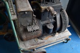 A vintage stationary engine, Kohler, USA, mounted on trolley