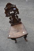A Black Forest hall chair having naturalistic design