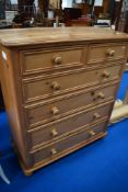 A modern natural pine chest of two over four drawers, height approx. 124cm