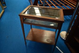 An Edwardian mahogany and inlaid bijouterie table