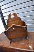 A period oak and leather paper stand