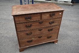 A 19th Century mahogany chest of two over three drawers having Georgian style handles and bracket