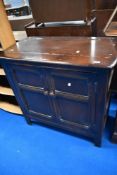 A vintage Ercol or similar narrow dresser base/side cabinet