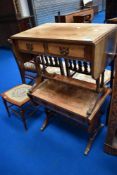 A pair of reproduction drop leaf occasional tables