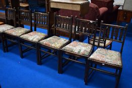 A set of six mid 20th Century wave back dining chairs